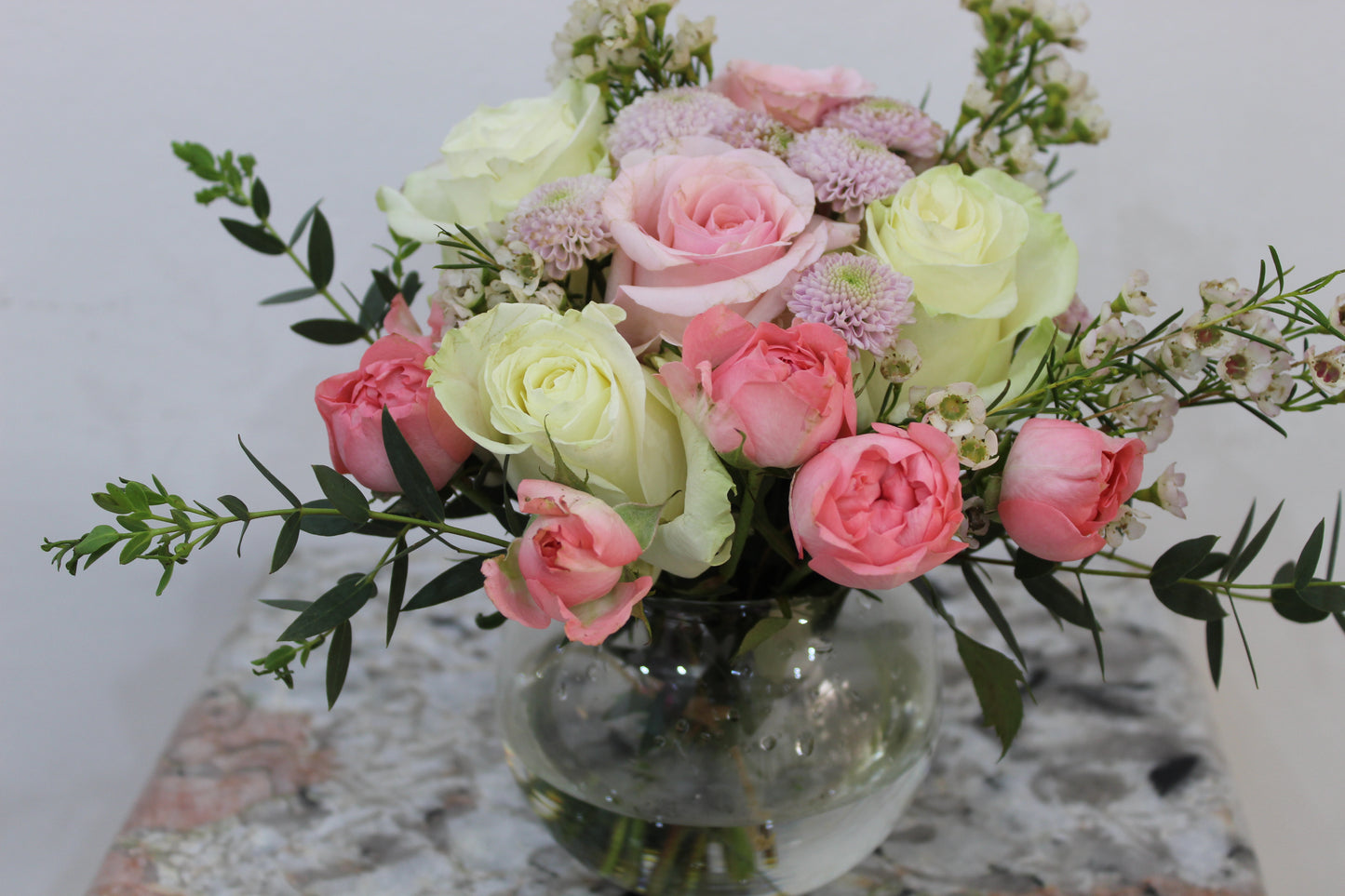 Pinkish Harmony Atelier: Elegant Floral Arrangement in fish bowl